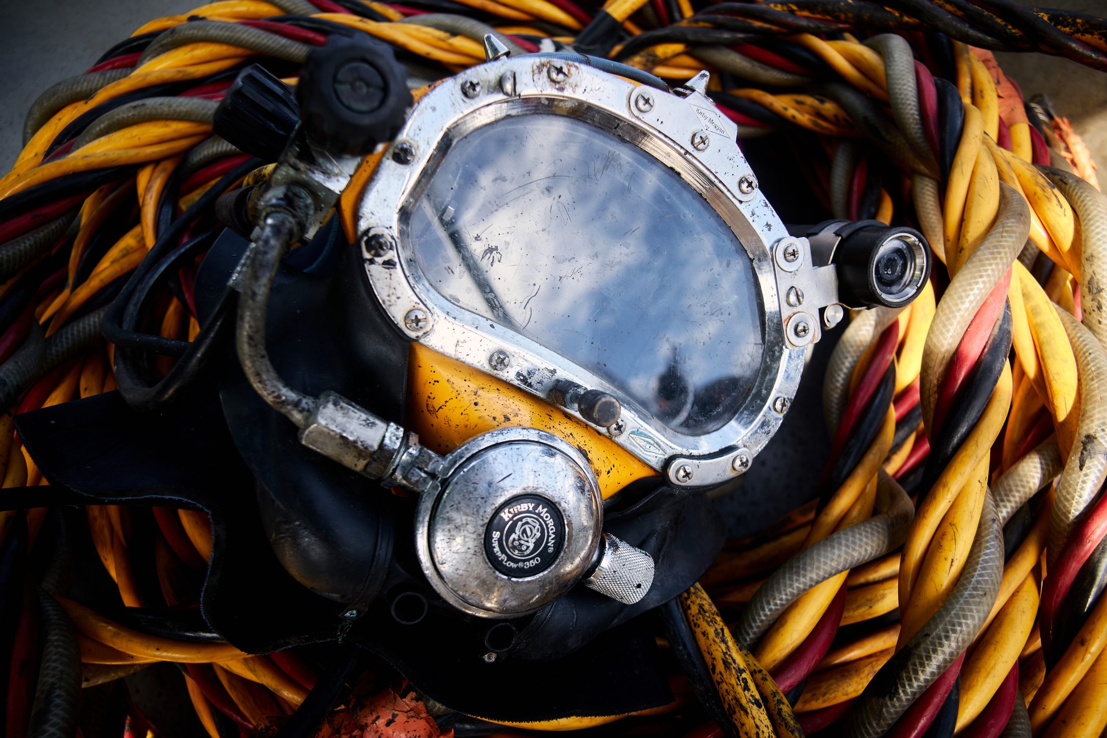 Commercial diver in helmet during subsea construction operation