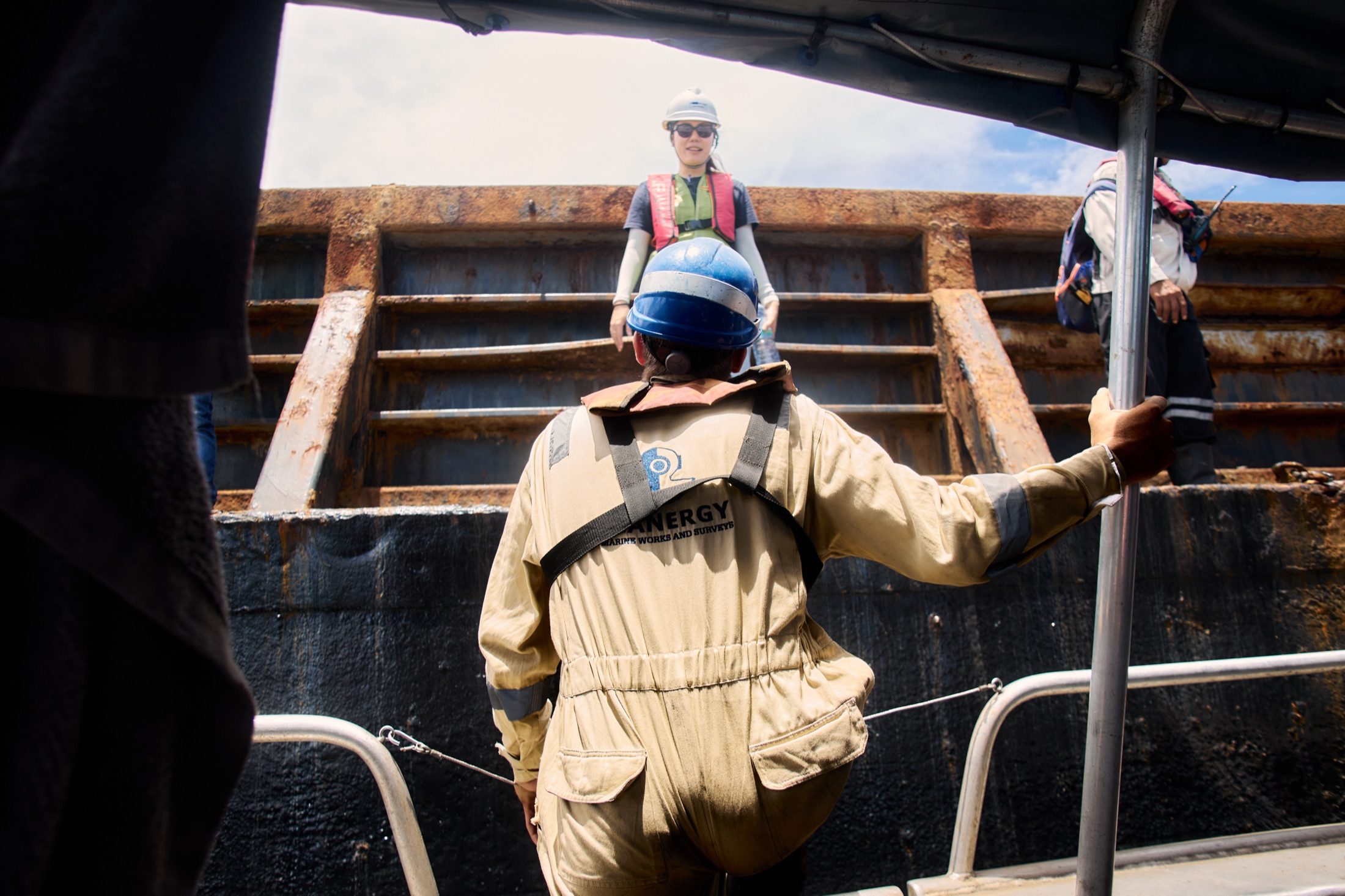 Seanergy team member on barge, a human approach to marine operations
